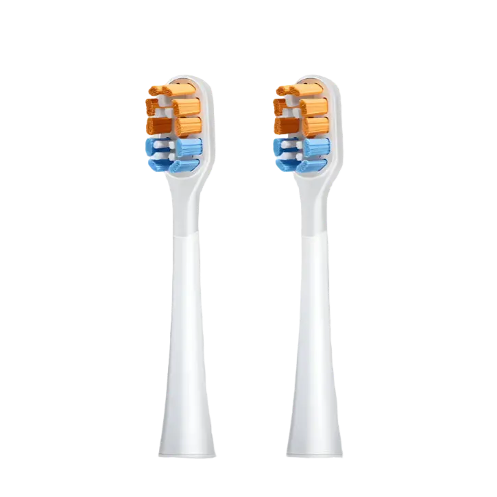 Two toothbrush heads with colorful bristle patterns on a light gray background